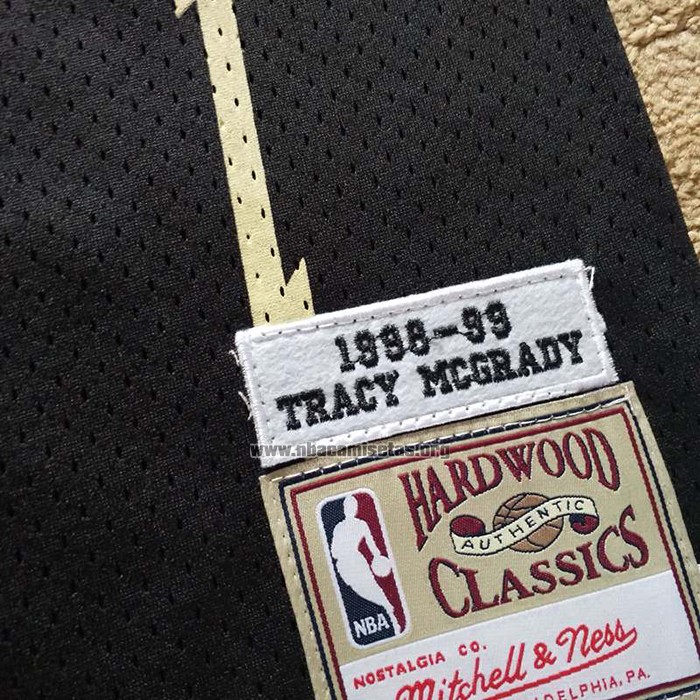 Camiseta Toronto Raptors Tracy McGrady NO 1 Mitchell & Ness 1998-99 Negro